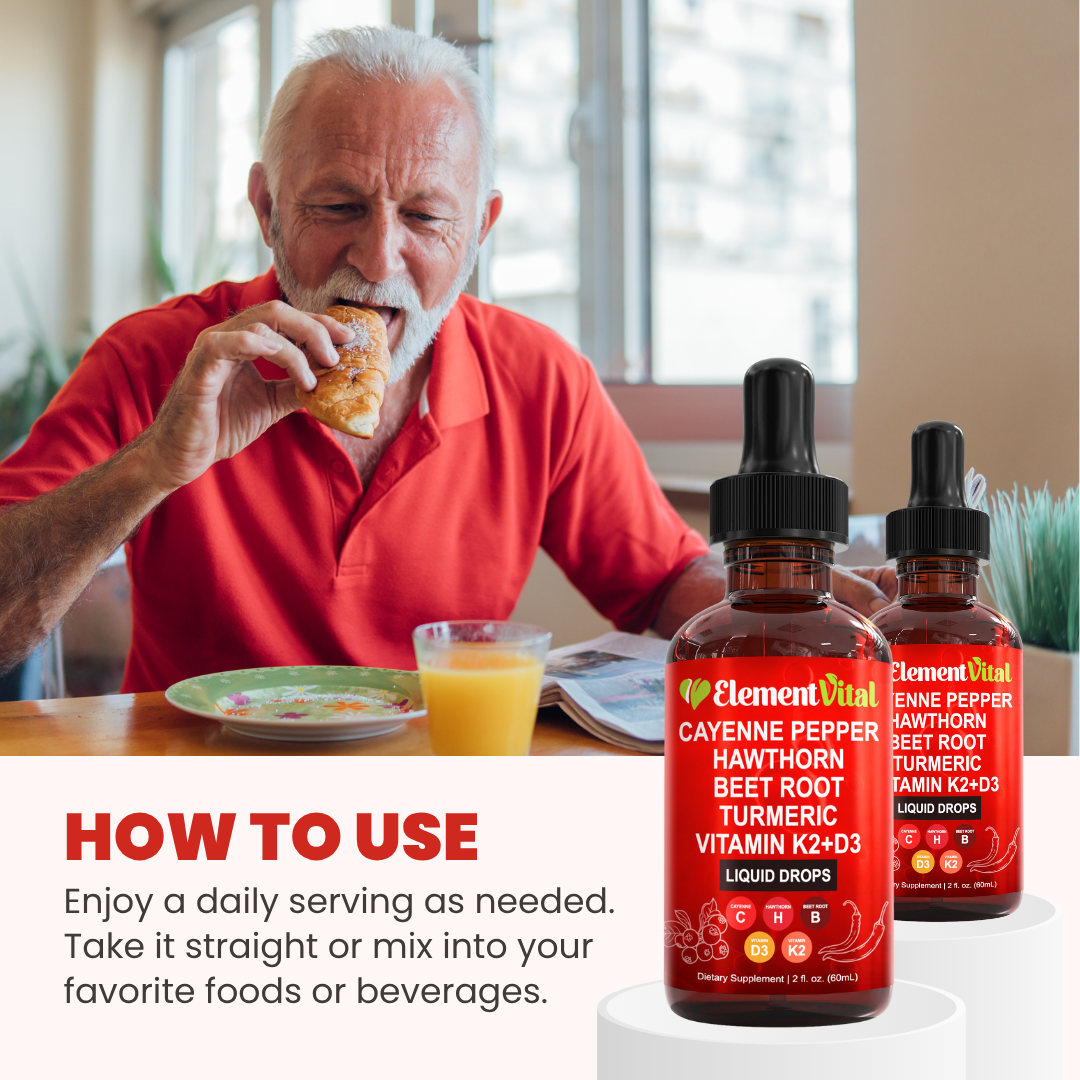 Man eating a pastry with Element Vital Cayenne Pepper supplement bottles on a table.