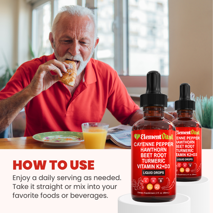 Man eating a pastry with Element Vital Cayenne Pepper supplement bottles on a table.